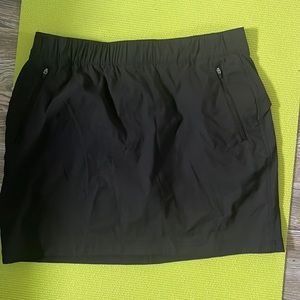 Like new! Eddie Bauer black womens skort with pockets and under lining. Size 16